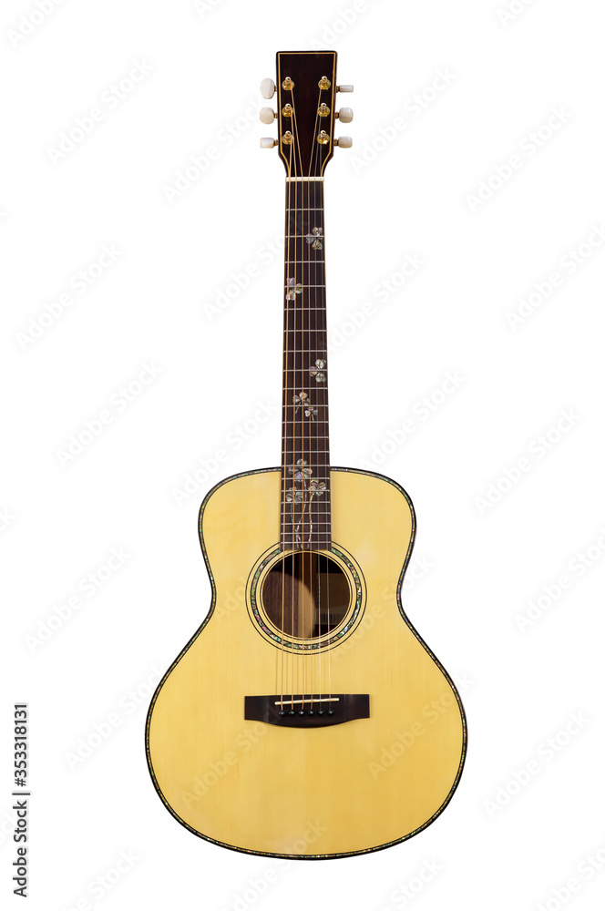 An acoustic guitar on a white back