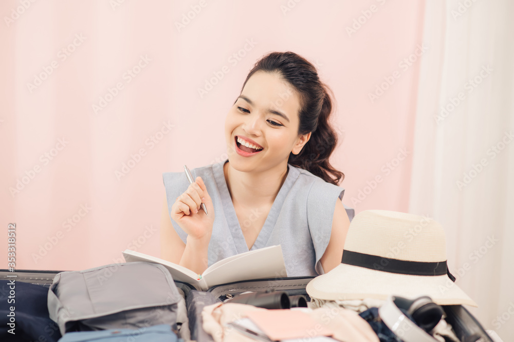 Attractive lady look aside sit on comfort soft cosy carpet rug near couch sofa in modern light house remember list make notes Attractive lady look aside sit on comfort soft cosy carpet rug near couch sofa in modern light house remember list make notes