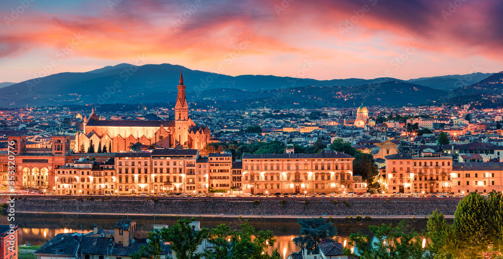 Panoramic summer cityscape of Florence with Cathedral of Santa Maria del Fiore (Duomo) and Basilica of Santa Croce. Breathtaking sunset in Tuscany, Italy, Europe. Traveling concept background.