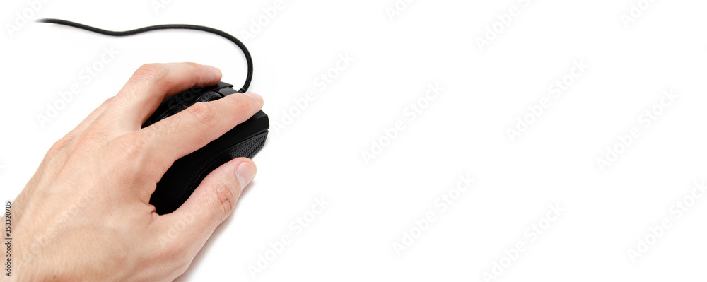 A male hand holds, controls, presses a wired black gaming mouse on a white background. The mouse is wired and wireless with additional side keys. Matte finish. Hand and mouse in macro and general plan A male hand holds, controls, presses a wired black gaming mouse on a white background. The mouse is wired and wireless with additional side keys. Matte finish. Hand and mouse in macro and general plan