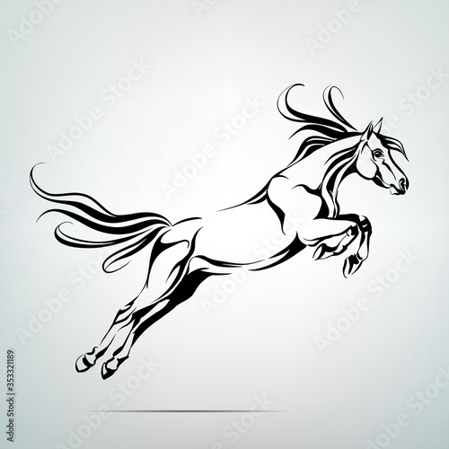 Silhouette of a horse in a jump