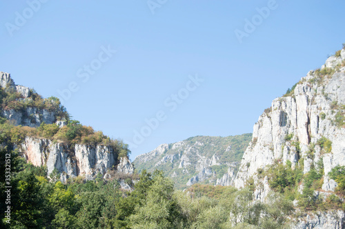 Serbian Countryside with White Cliffs and Green Trees © idraniwinardi