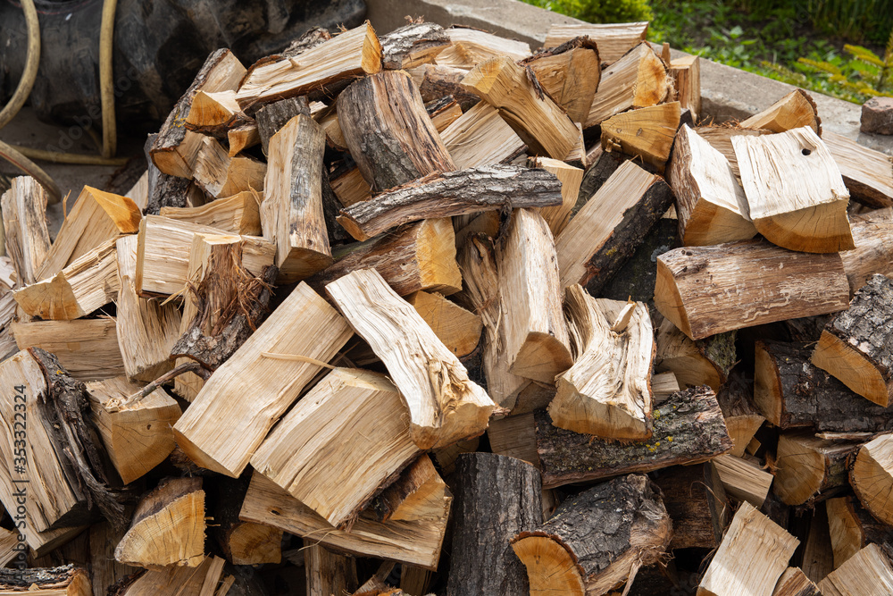 Pile of firewood in different sizes Pile of firewood in different sizes
