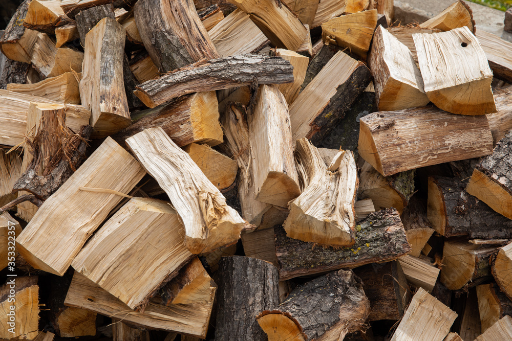 Pile of firewood in different sizes Pile of firewood in different sizes