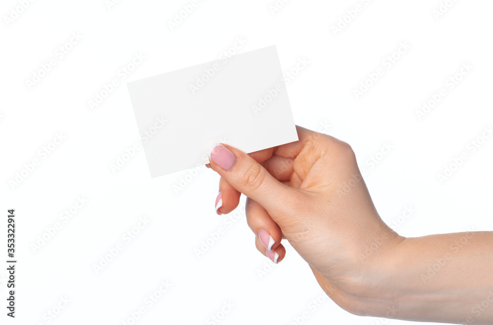 Female hand with blank white business card isolated on white Female hand with blank white business card isolated on white
