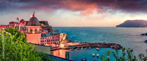 Windy evening scene of Vernazza town. Fantastic sunset on Liguria, Cinque Terre, Italy, Europe. Beautiful seascape of Mediterranean sea. Traveling concept background.