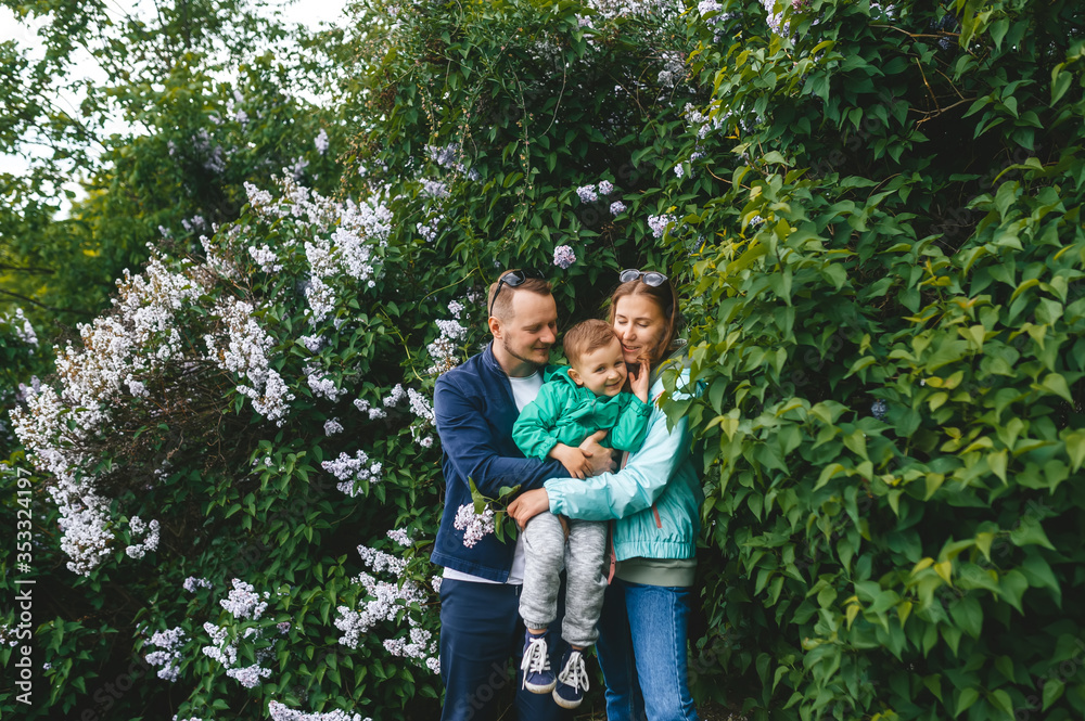 Fototapeta premium Family together outdoor in nature. Authentic lifestyle.