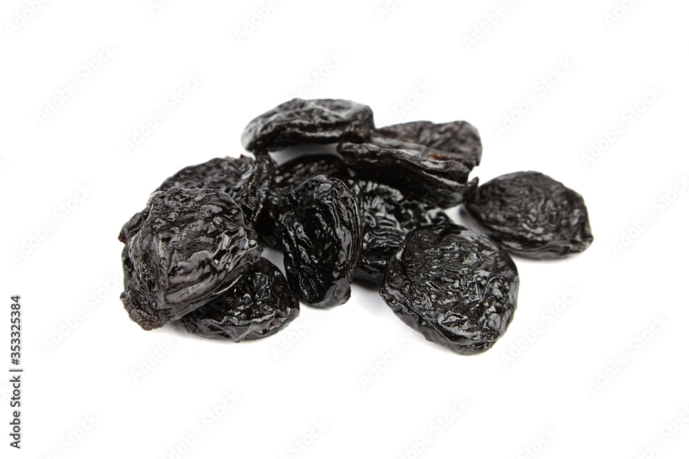 Prunes, dry plums isolated on white background. Heap of dried fruits Prunes, dry plums isolated on white background. Heap of dried fruits