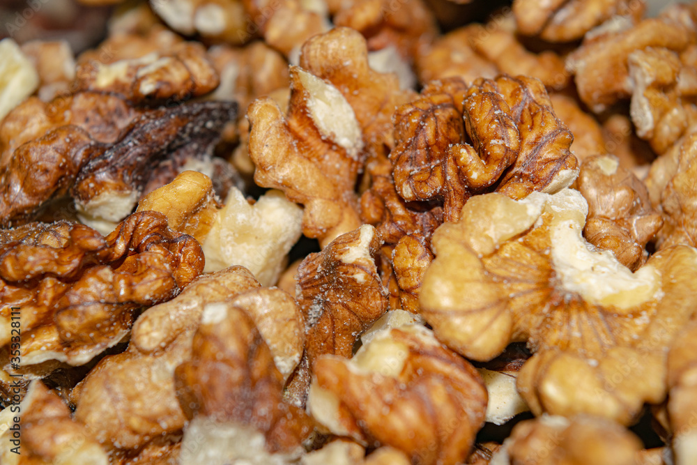 Peeled walnuts close-up. Surface texture. Healthy diet. Peeled walnuts close-up. Surface texture. Healthy diet.