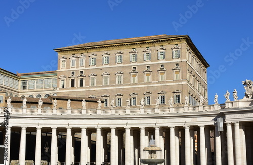 Bernini’s Colonnade and Apostolic Palace with the Papal Apartments at the St. Peter’s Square. Rome, Italy.
