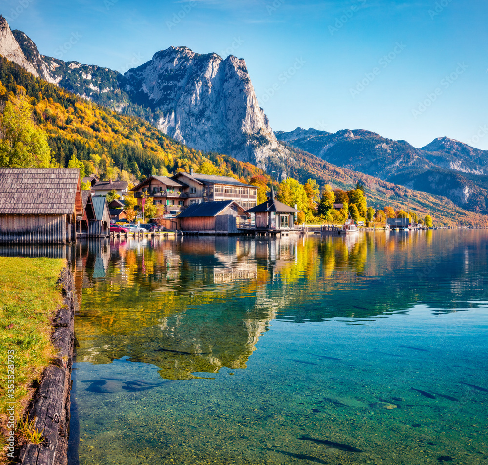 Fototapeta premium Wonderful sunny day on Grundlsee lake. Calm autumn view of Eastern Alps, Liezen District of Styria, Austria, Europe. Traveling concept background.