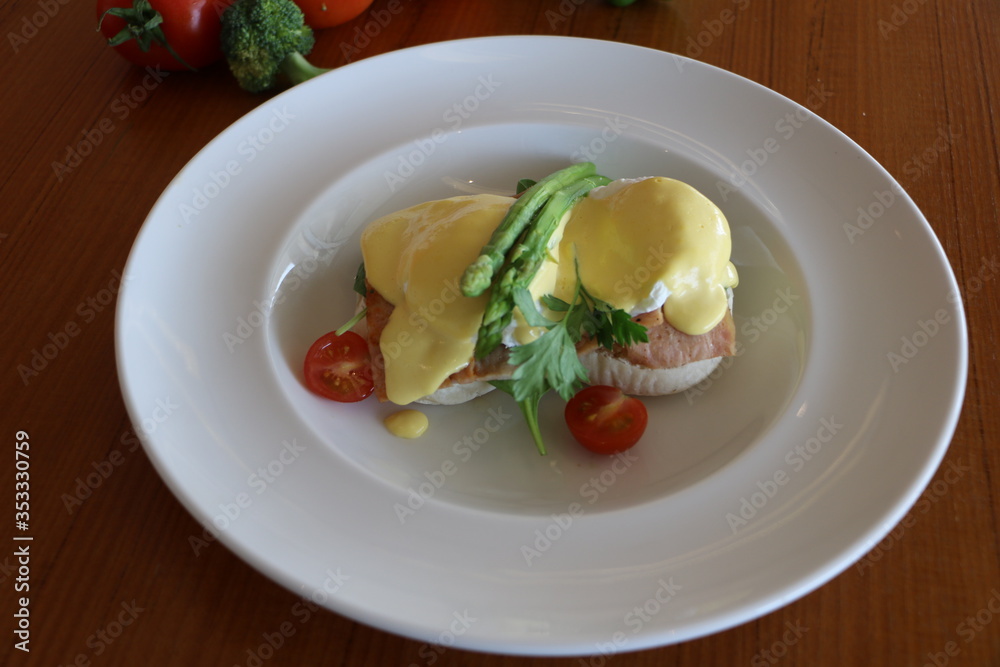 Eggs benedicts, Poached eggs on brioche bun,
turkey bacon, asparagus and
top with hollandaise sauce Eggs benedicts, Poached eggs on brioche bun,
turkey bacon, asparagus and
top with hollandaise sauce