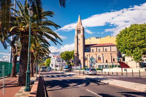 Bright summer cityscape of Bastia town with Iglesia Catholic church on background. Sunny morning view of Corsica island, France, Europe. Traveling concept background.