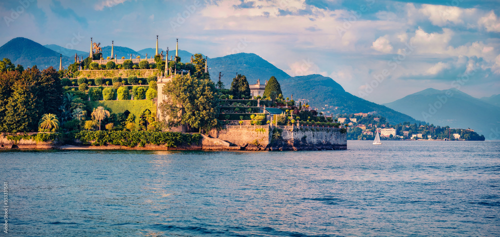 Panoramic morning cityscape of Bella island, Stresa town. Beautiful summer scene of Maggiore lake, Province of Verbano-Cusio-Ossola, Italy, Europe. Traveling concept background.