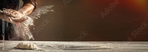 Fotografija Photo of flour and men hands with flour splash
