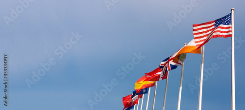 Canvas Print international global flag on blue sky with banner size