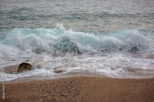 sea waves in the adriatic sea and the beach