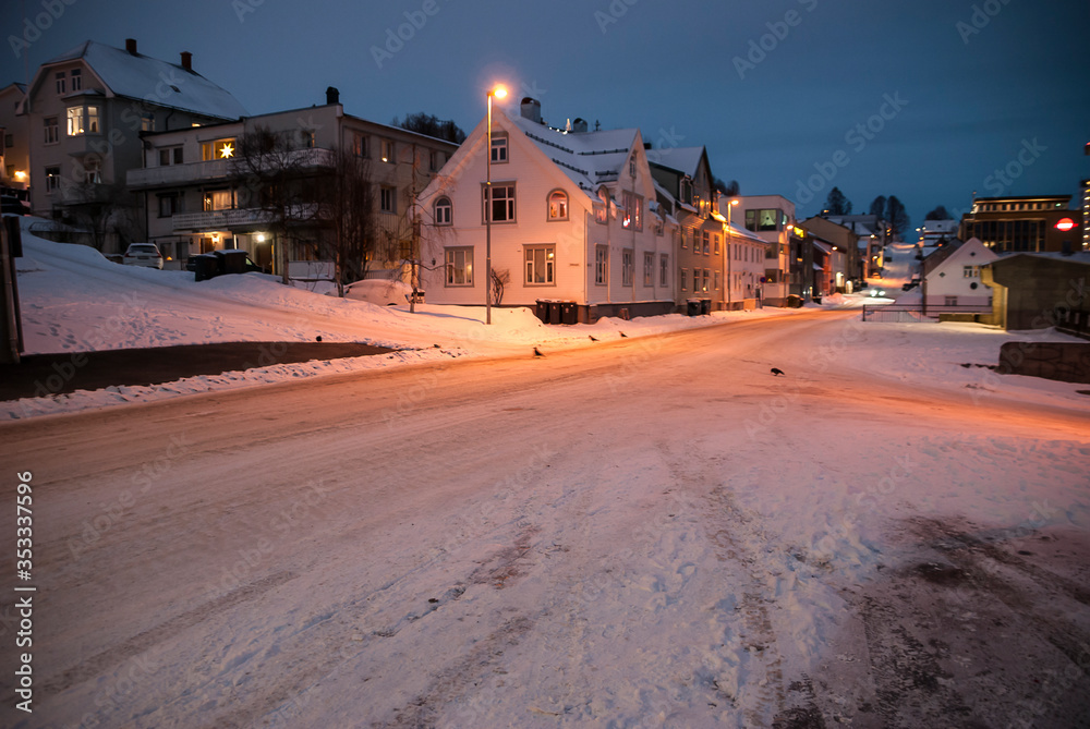 Snow-covered streets and houses, without people, in Tromsø in Norway