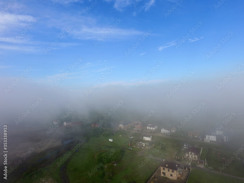 Aerial view saburb landscape (drone image). with the morning fog. Near Kiev Aerial view saburb landscape (drone image). with the morning fog. Near Kiev