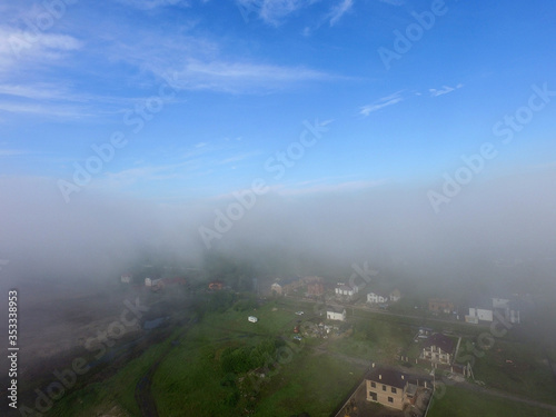 Aerial view saburb landscape (drone image). with the morning fog. Near Kiev