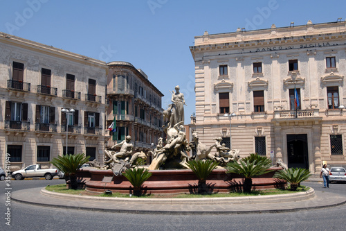 Italy  Sicily  Syracuse ,07/03/2007: Ortigia Island, the Diana fountain is a monumental fountain from 1907 by Giulio Moschetti  photo