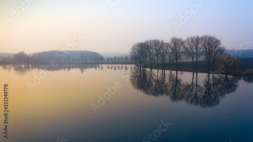 Morning summer landscape over the lake. Drone view.