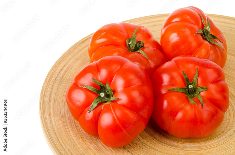 Red ripe juicy beeftomats isolated on white background Red ripe juicy beeftomats isolated on white background