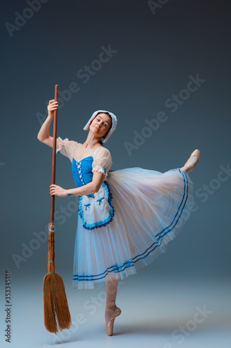 фотографія Young and graceful female ballet dancer as Cindrella fairytail character on studio background
