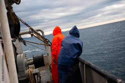 Fishermen on the deck of fishing vessel