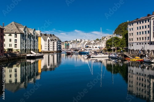 Alesund, Norway - June 2019: Great summer view of Alesund port town on the west coast of Norway, at the entrance to the Geirangerfjord. Old architecture of Alesund town in city centre. © F8  \ Suport Ukraine