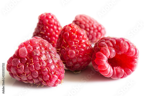 Fresh ripe raspberries on a white background. Close-up.