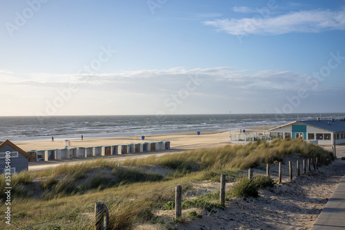 Empty beach houses along the shore and on the beaches are empty.