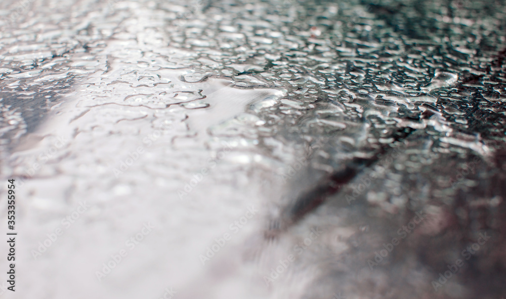 water drops on a glass water drops on a glass