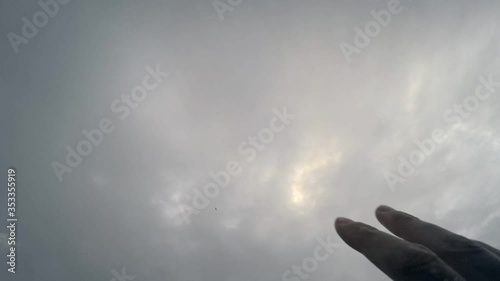 touch your hand to the sky and clouds