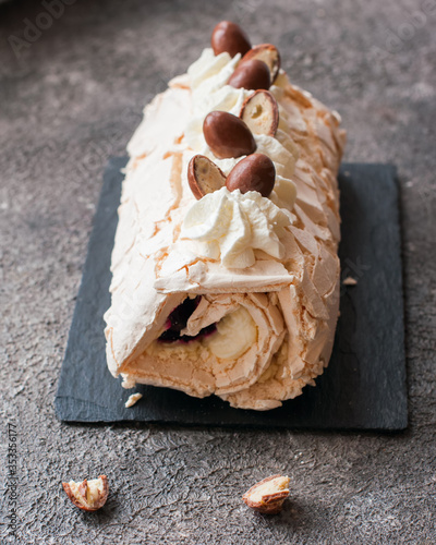 Swiss meringue roll  baked dessert from whipped egg photo