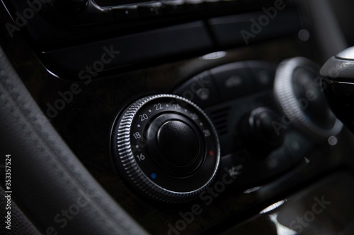 Car air conditioner regulator. Modern car interior