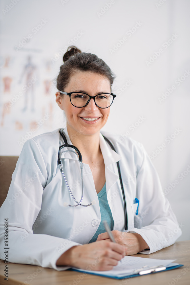 Female doctor posing at the clinic Female doctor posing at the clinic