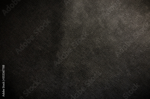 The black cattle skin texture with empty place for text top view, background for your text. Flat lay