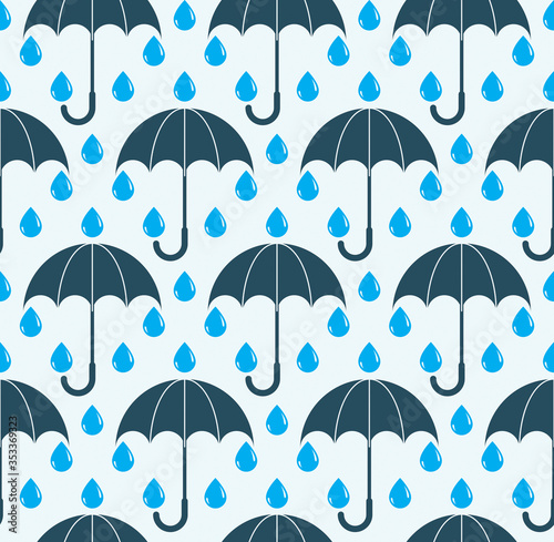 Falling rain drops and umbr...