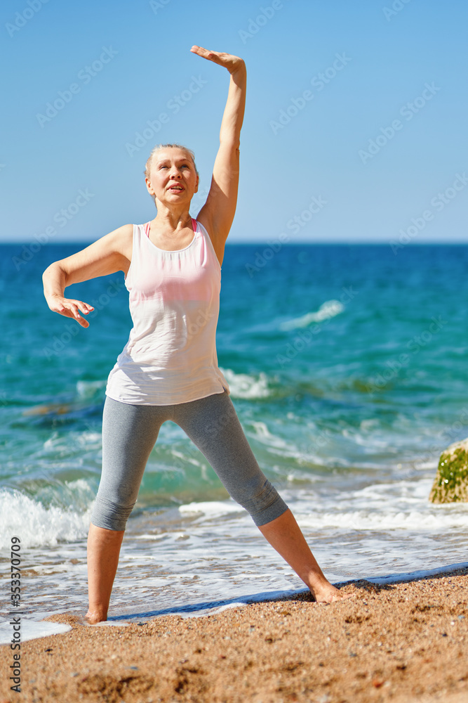 Portrait of senior woman exercise in for sports at sea Portrait of senior woman exercise in for sports at sea