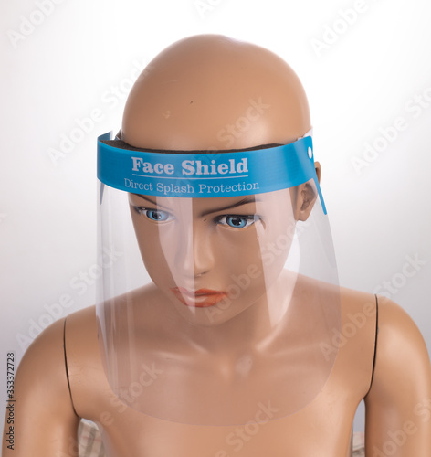 Medical face mask or shield. Transparent plastic helmet. Coronavirus quarantine concept. Protective measures for flu. Virus outbreak prevention and pollution protection
