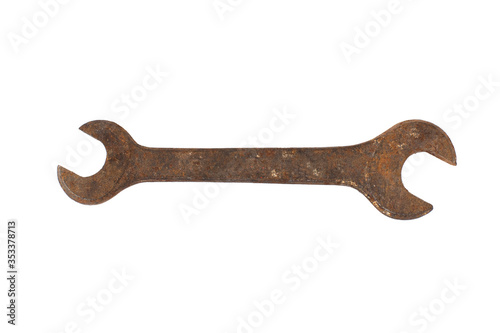 Rusted wrench or spanner isolated on a white background