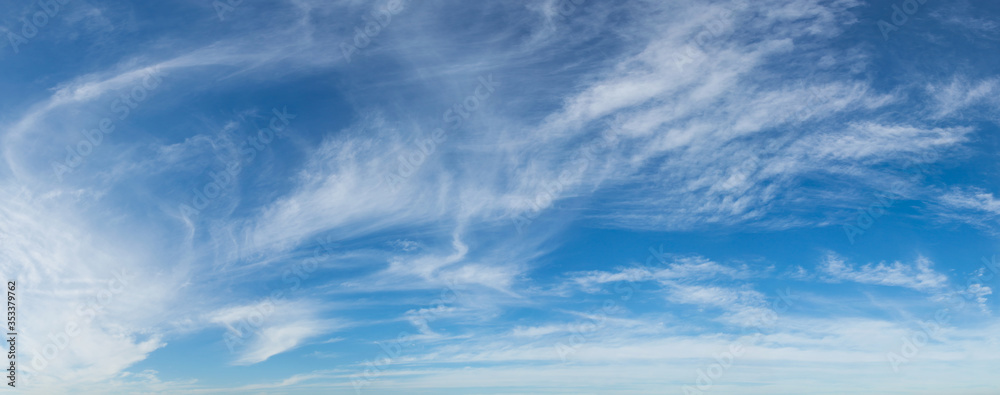 Fototapeta premium Abstract white clouds and Blue sky in sunny day background.Natural Celestial World concept with blue sky and clouds Use as background.