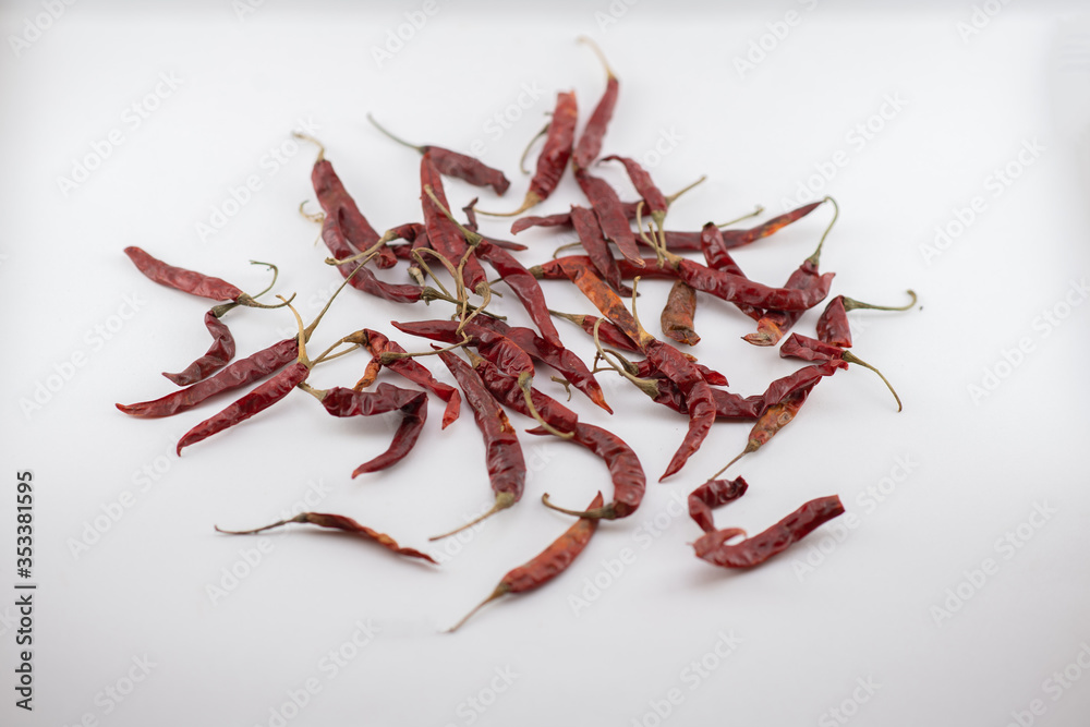 Dried red chili or chilli cayenne pepper isolated on white background cutout Dried red chili or chilli cayenne pepper isolated on white background cutout