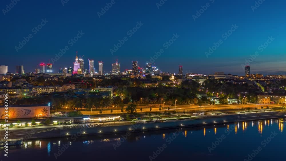 panorama timelapse of night Warsaw city centre over Wisla river in Poland panorama timelapse of night Warsaw city centre over Wisla river in Poland