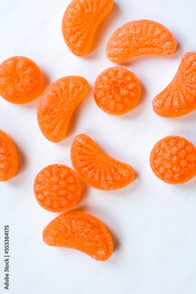 little fruit colored sweet lollipops isolated on white background little fruit colored sweet lollipops isolated on white background
