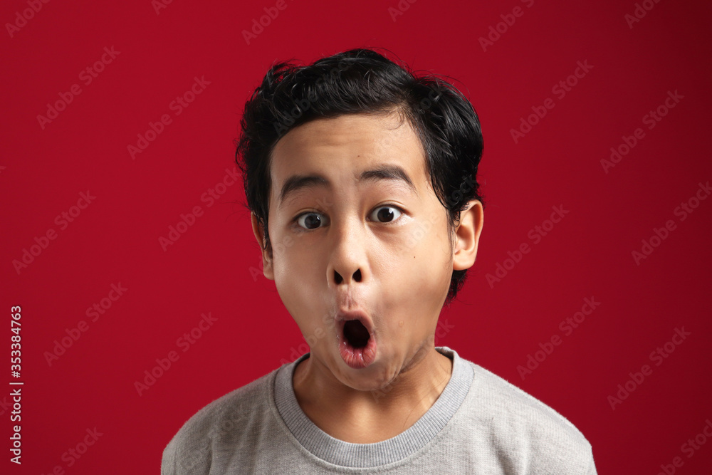 Shocked Surprised Asian Boy, Big Eyes and Open Mouth Shocked Surprised Asian Boy, Big Eyes and Open Mouth