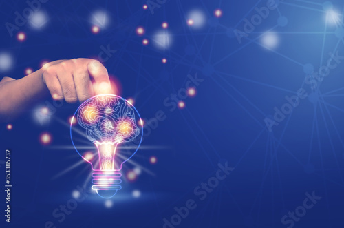 Light bulb with brain inside the hands of the businessman and point connecting network on blue background. Creative The brain in the light bulb, The concept of the business idea