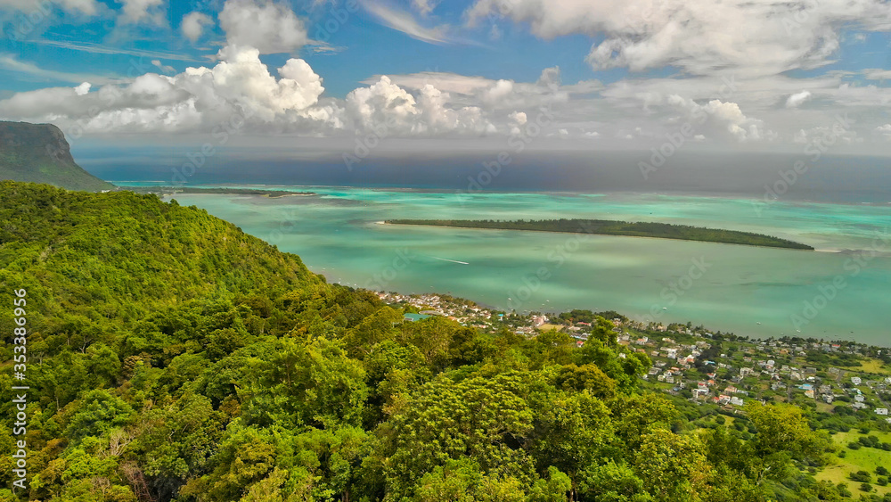 Panoramic aerial view of Mauritius coastline, Africa. Sunny day with ocean and vegetation Panoramic aerial view of Mauritius coastline, Africa. Sunny day with ocean and vegetation