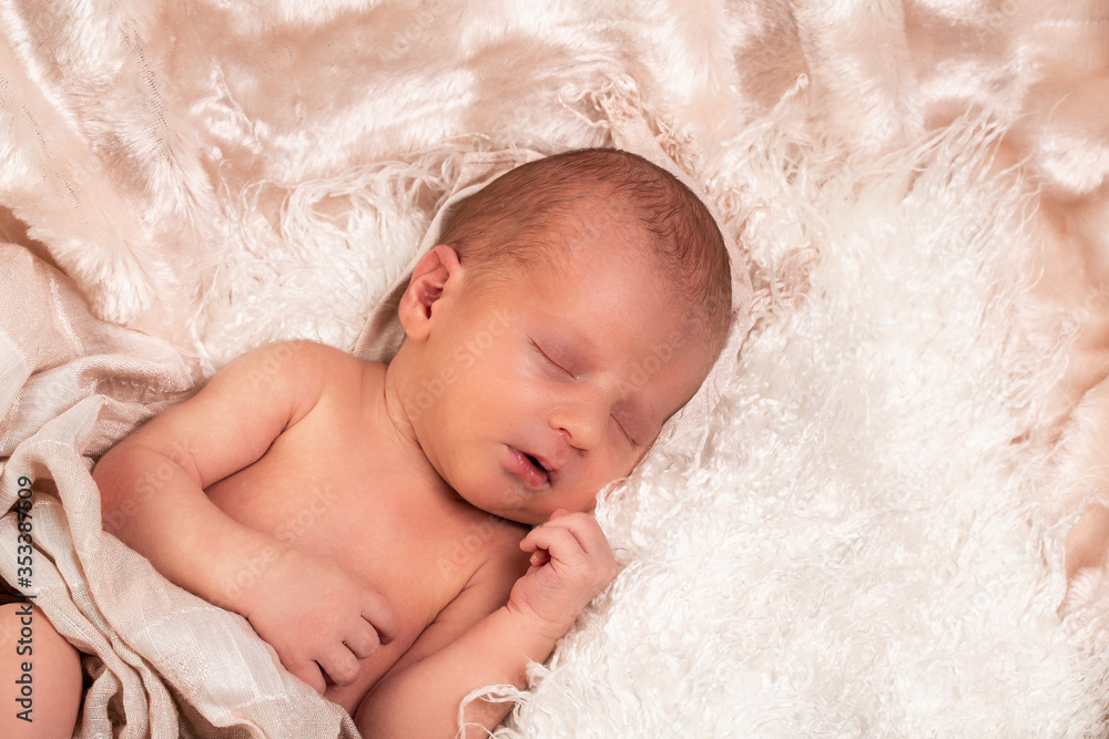picture of a newborn baby sleeping on a blanket rolled picture of a newborn baby sleeping on a blanket rolled